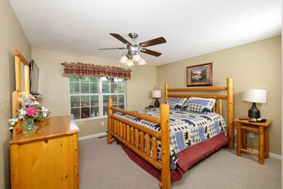 Timber Tree Lodge main level bedroom 2 with king size bed