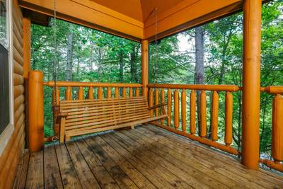 Timber Tree Lodge covered back deck with swing