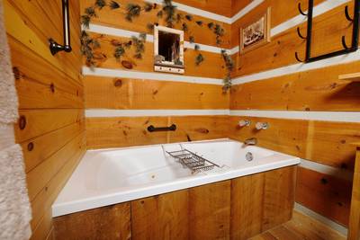Mountain Magic main level bathroom 1 with whirlpool tub