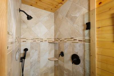 Mountain Magic main level bathroom 1 with walk in shower