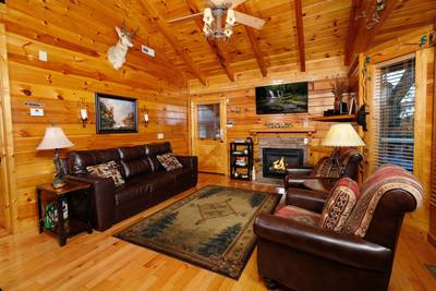 River Falls living room with leather sleeper sofa
