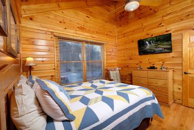 River Falls bedroom two with 43-inch flat screen TV