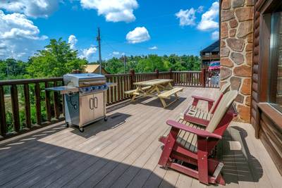 Perky Peaks Lodge - Main level side deck with gas grill and double gliding rockers