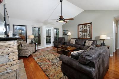 Whispering River living room with recliner