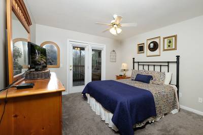 Whispering River bedroom 2 with queen size bed