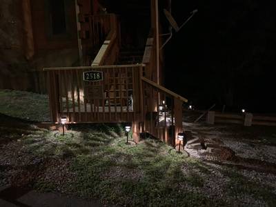 Baby Bear Cabin - Entrance and light display at night