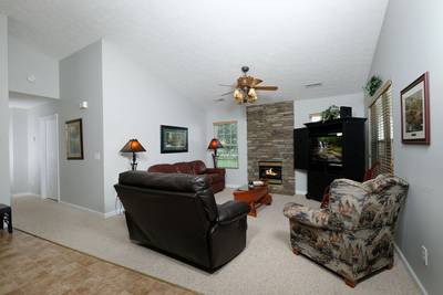 Lee's Creekside living room with year round electric fireplace