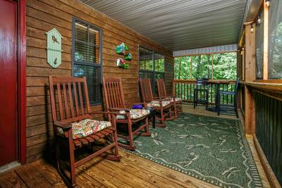 S'more Family Fun - Screened in front deck with rocking chairs and seating area