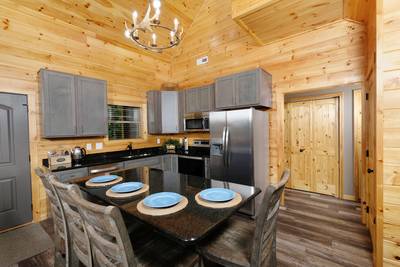 Wild Heat Lodge dining room and fully furnished kitchen