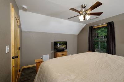 Wild Heart Lodge - Upper Level Bedroom with king bed and flat screen TV