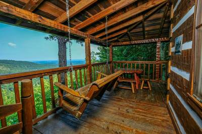 Old Glory covered deck with swing