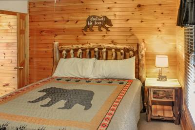 Fuzzy Bear main level bedroom 1 with king size bed