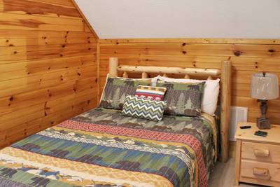 Fuzzy Bear upper level bedroom 2 with queen size bed
