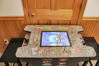 Fuzzy Bear upper level bedroom 3 with cocktail style multi-cade machine