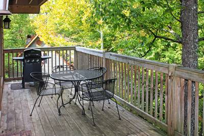 Mountain Side main level wraparound deck with gas grill