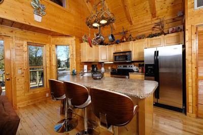 River Livin countertop bar and fully furnished kitchen