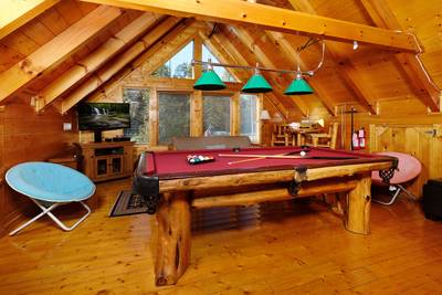 River Livin upper level loft game room