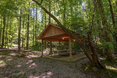 Caney Creek Mountain Area community pavilion with picnic tables