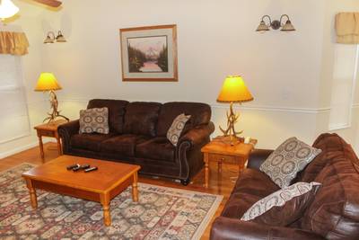 Grand River Canyon living room with leather sleeper sofa