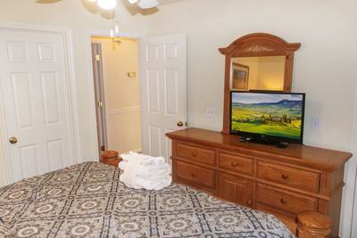 Grand River Canyon bedroom one with 32-inch flat screen TV