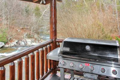 Creekside Lodge main level covered deck with gas grill