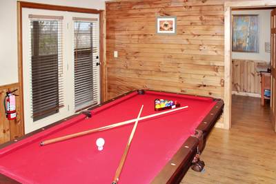 Mountain Side lower level game room with pool table