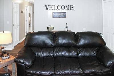 Rustic Acres living room with leather furniture