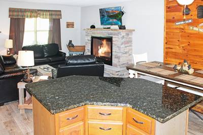 Rustic Acres kitchen island and living room