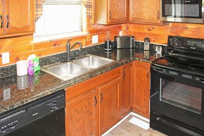 Rustic Acres fully furnished kitchen with granite countertops