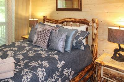 Striking Waters lower level bedroom three with queen size bed