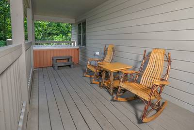 Lone Pine Lodge covered back deck with rocking chairs