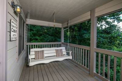 Lone Pine Lodge covered back deck with swing