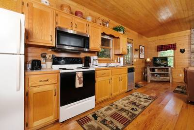 Bearfootin fully furnished kitchen and living room
