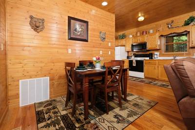Bearfootin dining area and fully furnished kitchen