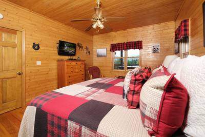 Bearfootin bedroom with 36-inch TV