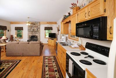 Nestled Inn kitchen and living room area