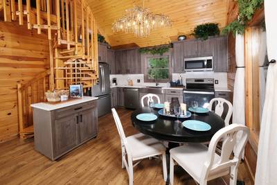 My Pigeon Forge Cabin dining area and fully furnished kitchen