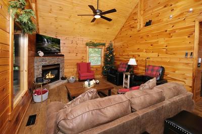 My Pigeon Forge Cabin living room with gas fireplace