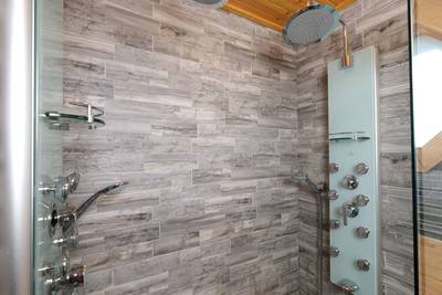 My Pigeon Forge Cabin main level bathroom 1 Spa shower