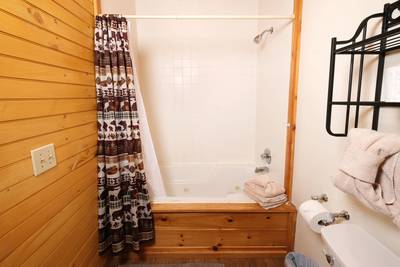 My Pigeon Forge Cabin upper level bathroom 3 with whirlpool tub/shower combo