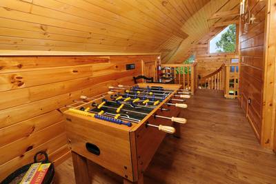 My Pigeon Forge Cabin upper level loft area with foosball table