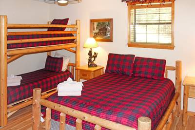 A Beary Good Time lower level bedroom three with twin bunk beds and full size bed