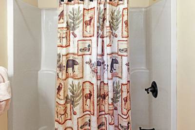 A Beary Good Time lower level bathroom three tub/shower combo