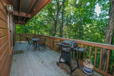 Grandpas Getaway main level wraparound deck with gas grill