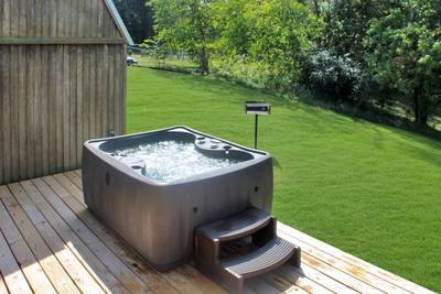 Rustic Acres back deck with hot tub