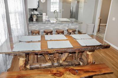 Alluring River custom built dining table with fully furnished kitchen