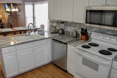 Alluring River fully furnished kitchen with granite counter tops