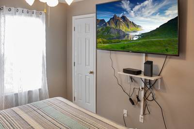 Alluring River Main Level bedroom 2 65-inch TV