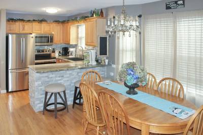 Striking Waters dining area and fully furnished kitchen