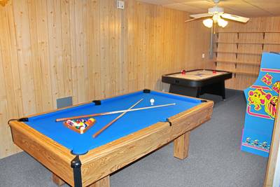 Alluring River lower level game room pool table